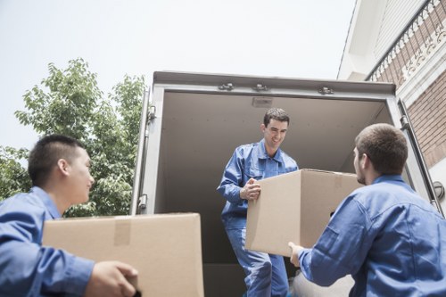 Removal crew loading items for a local North London relocation