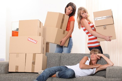 Boxes, protective wrapping, and dismantled furniture prepared for a Dartmouth Park removal